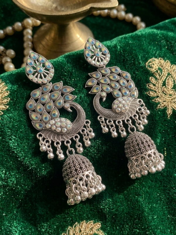 Silver peacock jhumka earrings for women with antique ethnic traditional design