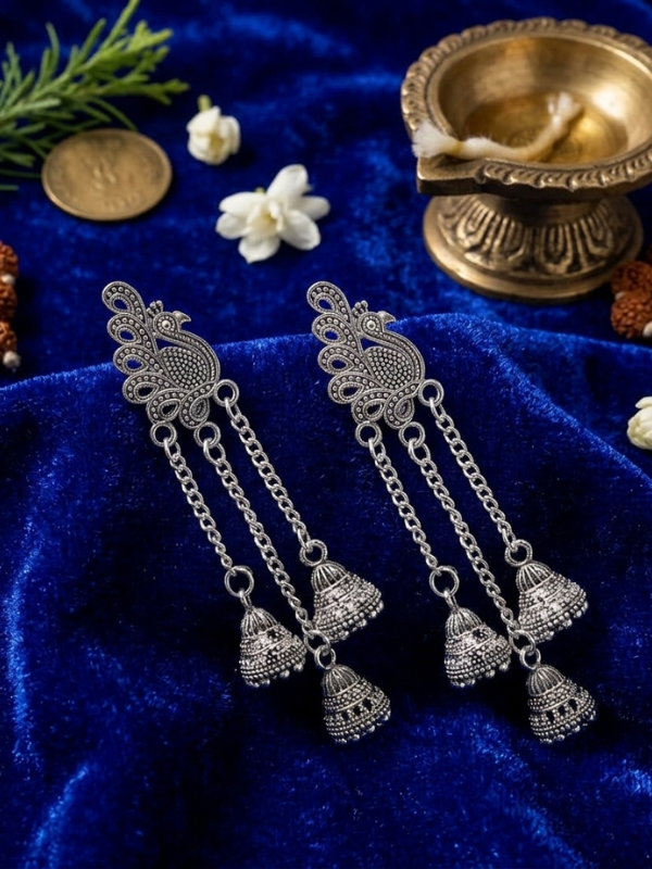 Silver peacock jhumka earrings for women with antique ethnic traditional design